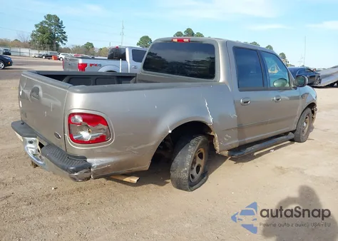 2002 Ford F-150 Lariat/Xlt z USA, uszkodzony, nr VIN 1FTRW076X2KA74193